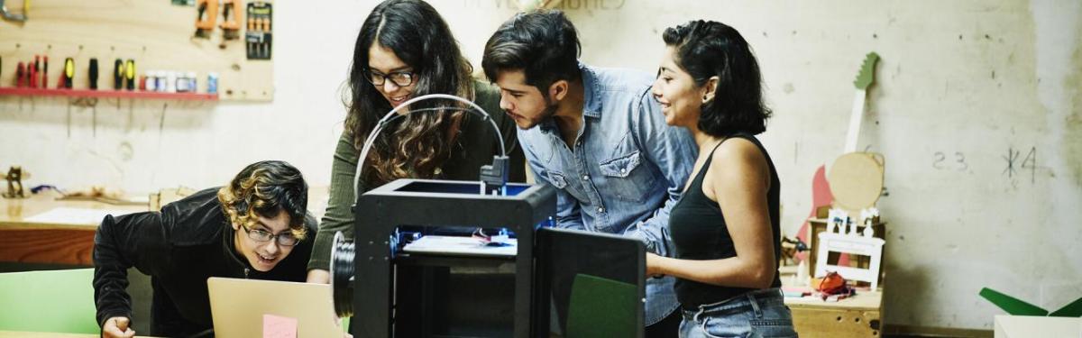 Young people working on a scientific project together