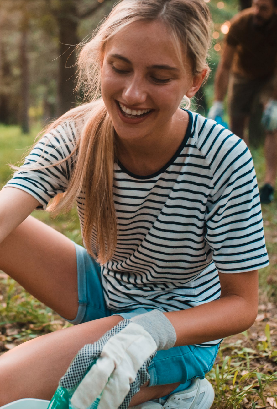 employee volunteering at a cleanup