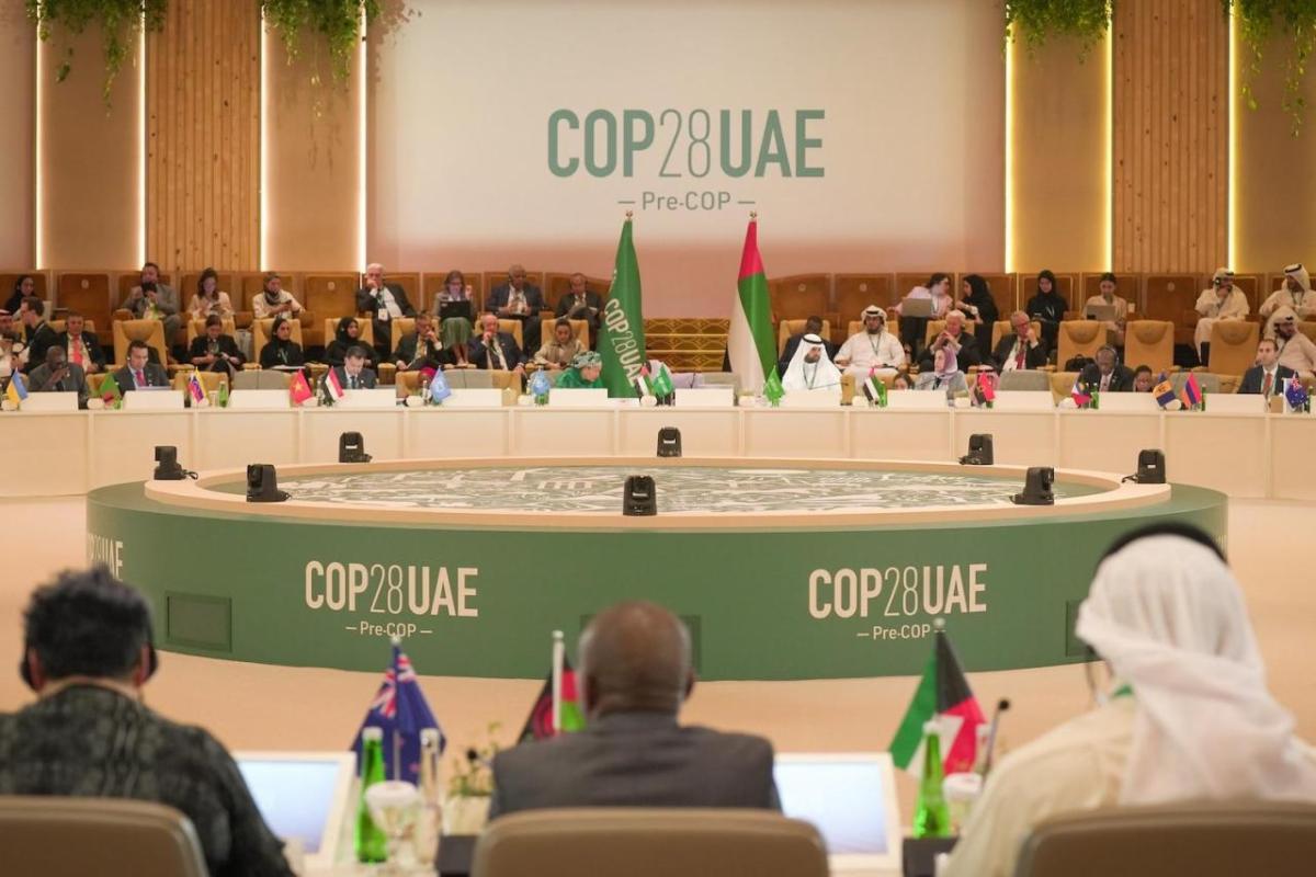 People seated at COP28 talks