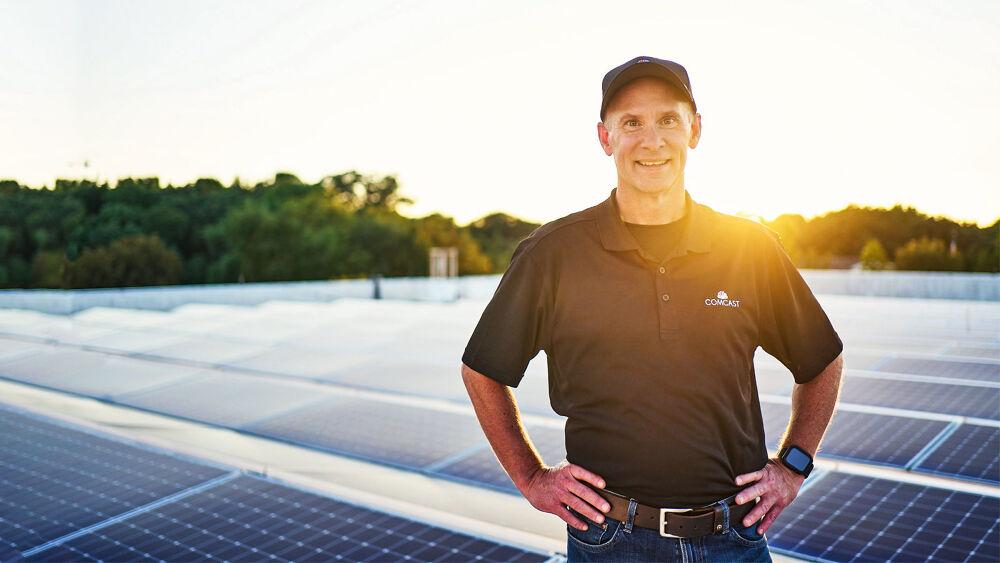 person with solar panels