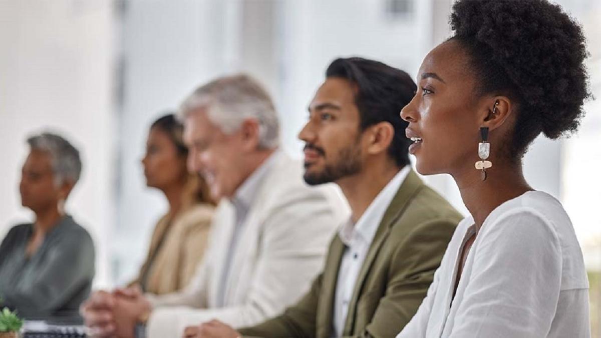 Diverse group sitting together in office