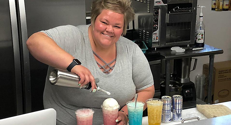 Kelsie Kay Haskell making smoothies