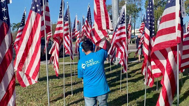 duke energy employee among many American flags