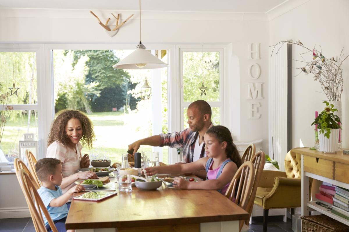 Family eating a meal at the table