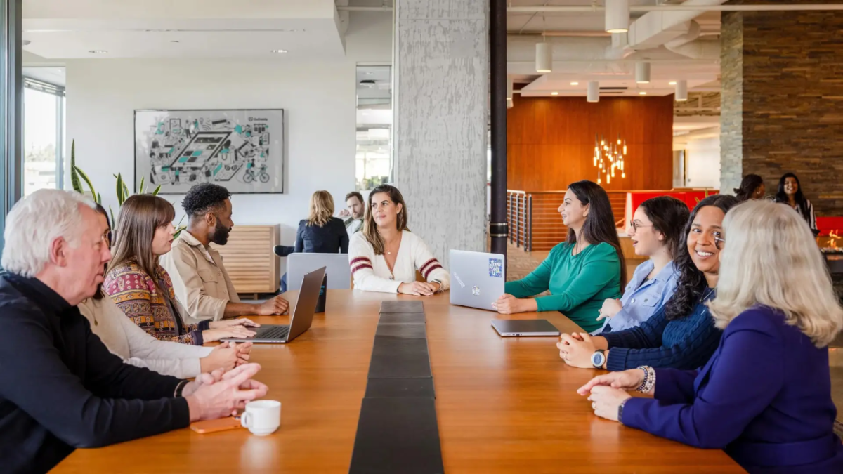 People sitting around a conference table