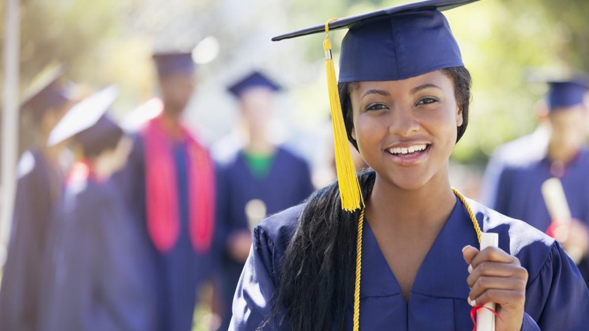 student in graduation cap and gown