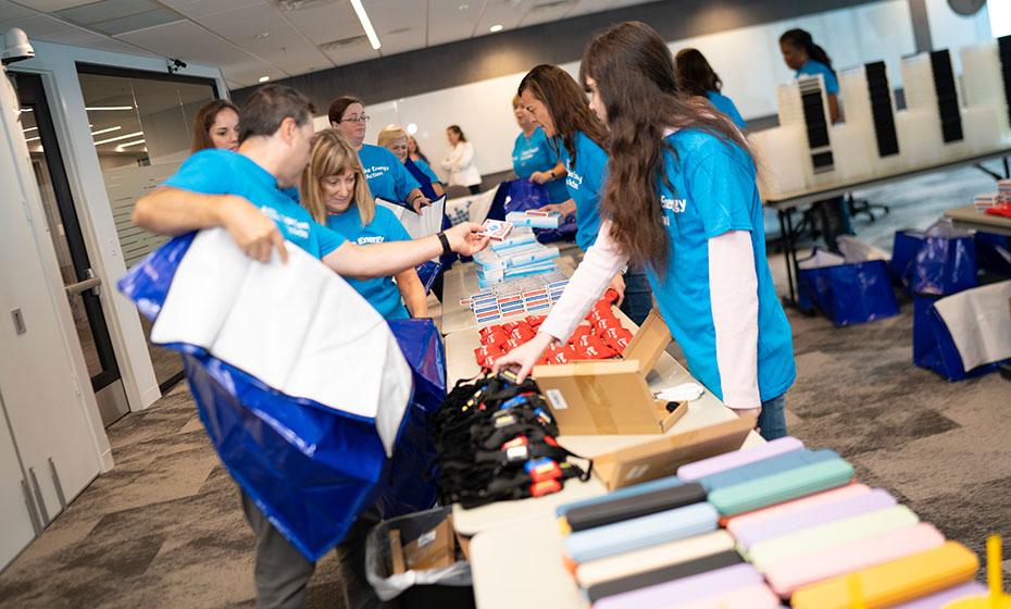 Duke Energy employee volunteers packing Storm kits 