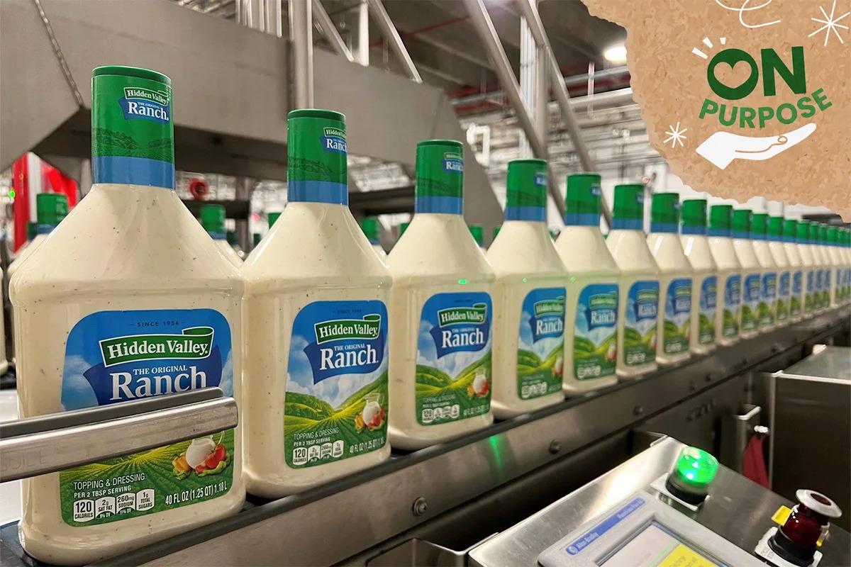 Bottles of Ranch dressing on a conveyor line