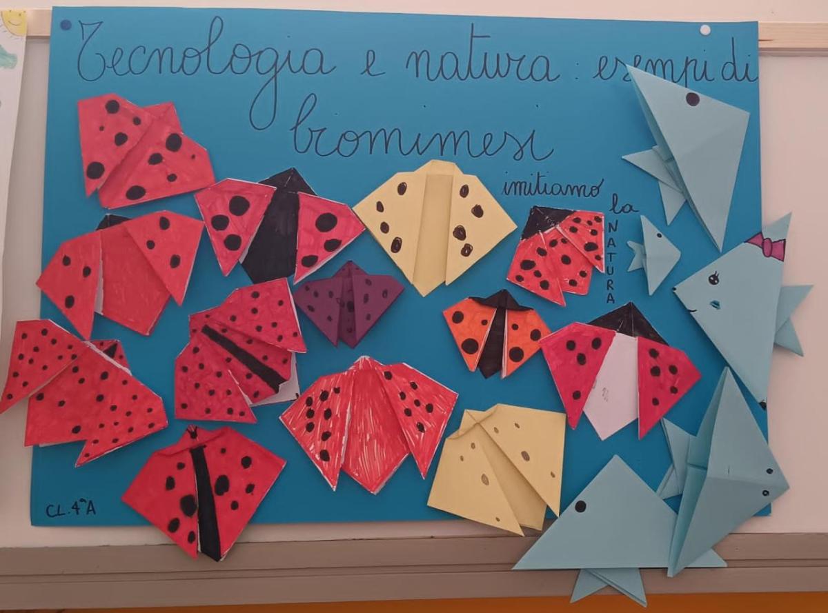 A paper poster with various handmade animals