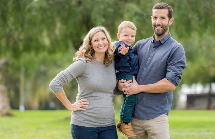 Christina and Daniel Kettler holding baby Fitz.