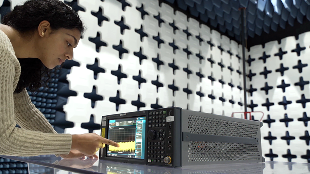 woman working on a testing machine