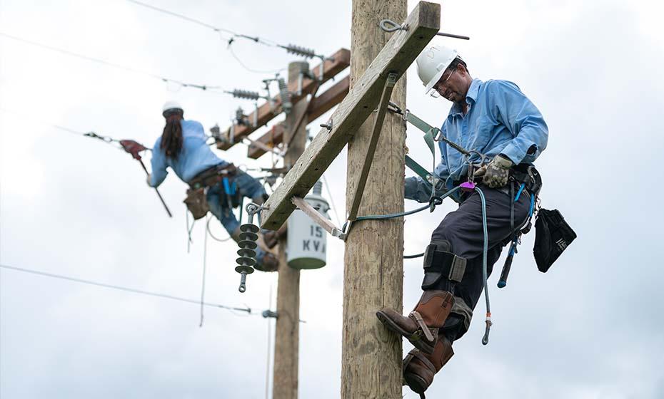 Lineworkers working on powerline