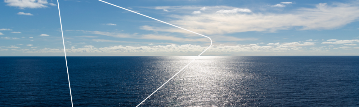 a panoramic view of open ocean. a partly cloudy sky and the sun reflecting off the water