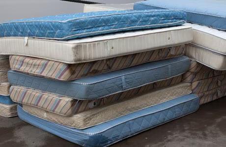 Piles of old mattresses