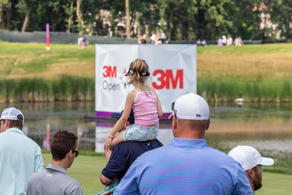 Spectators at a golf tournament