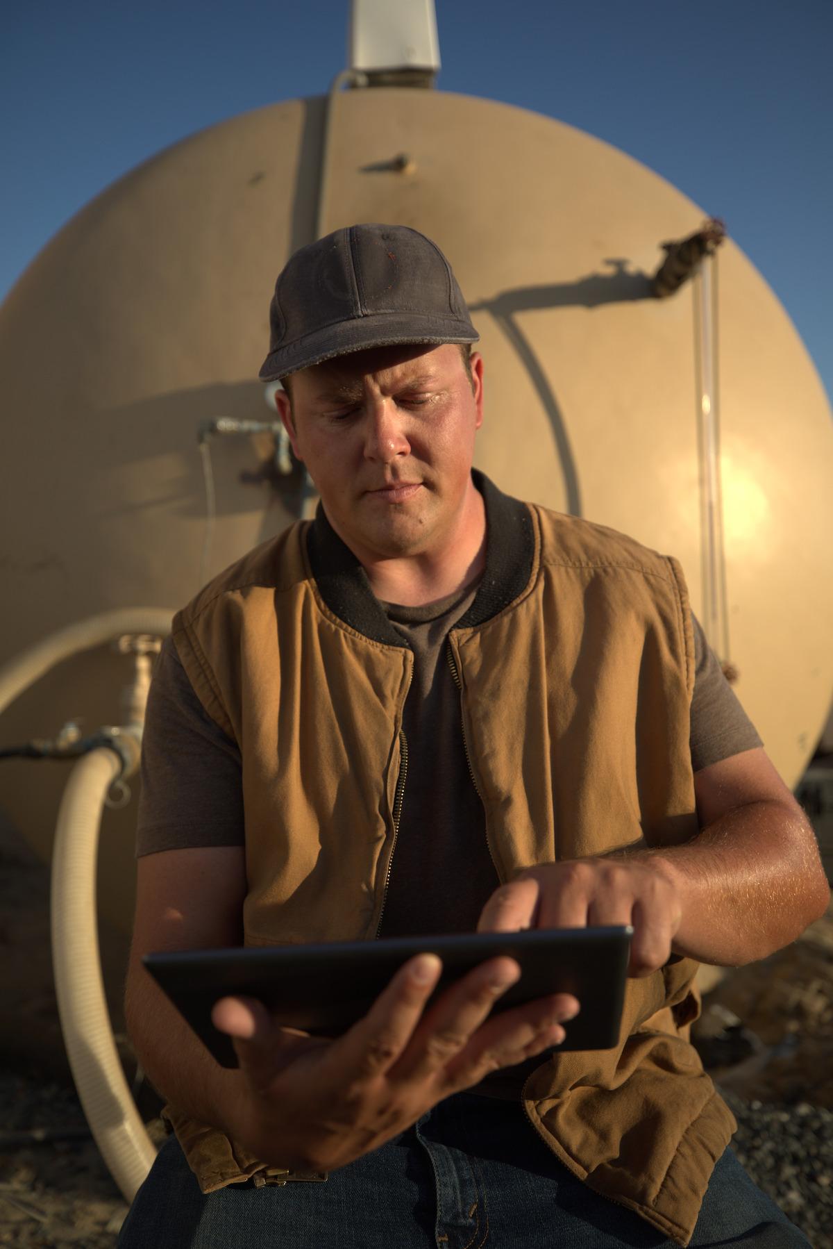 person working on a dairy farm