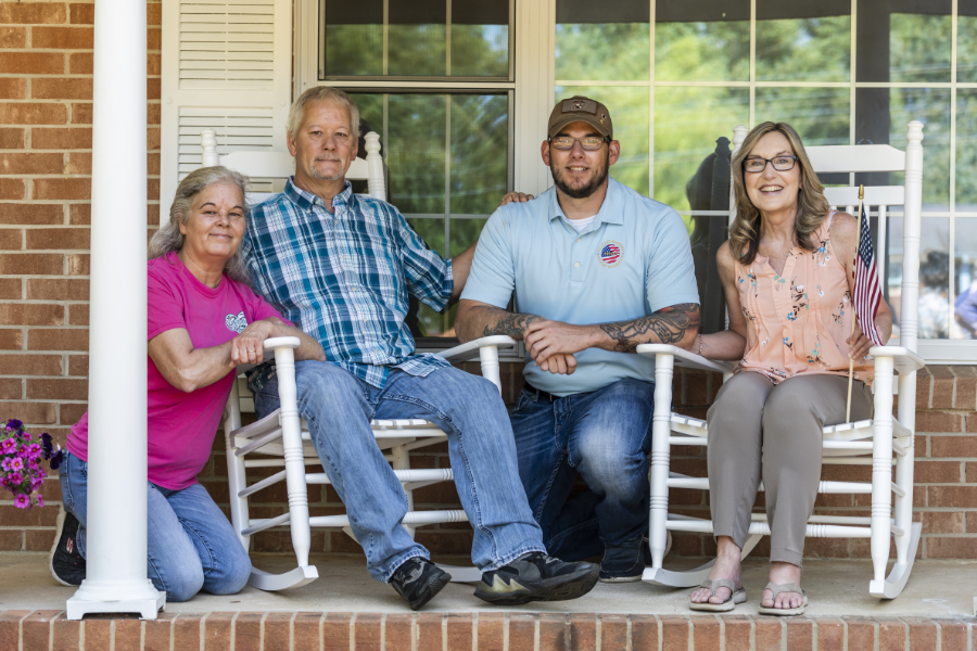 Sgt. David Long and family members on the front porch