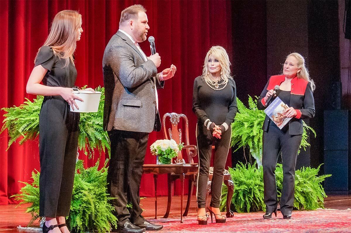 four presenters on stage