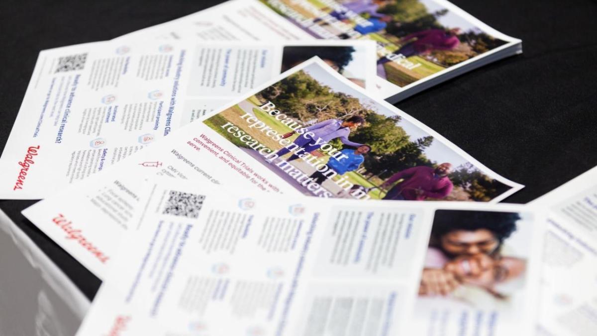 Pamphlets on a table about diversity in clinical trials