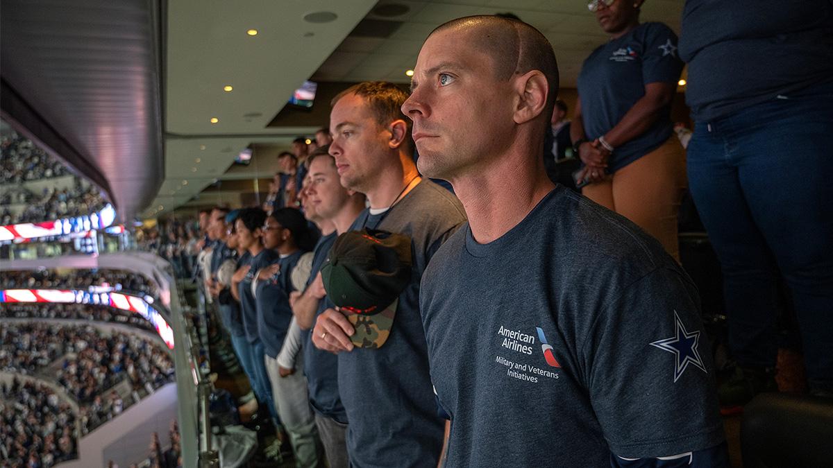 People wearing an American airlines t-shirt at a game