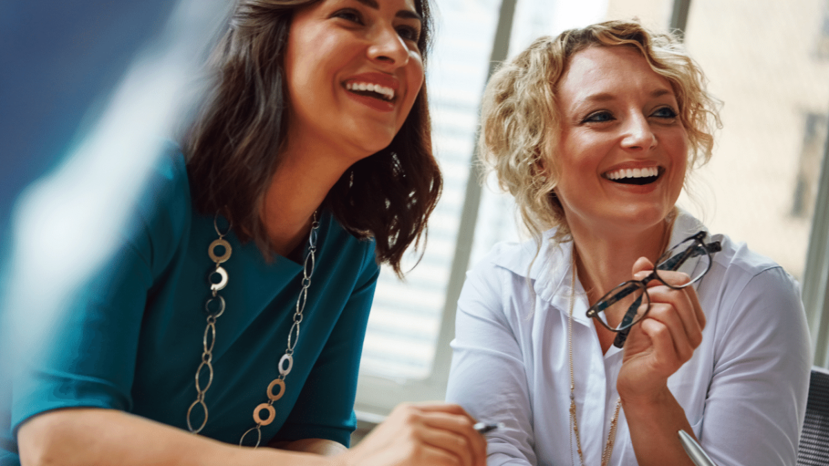 Two women smiling