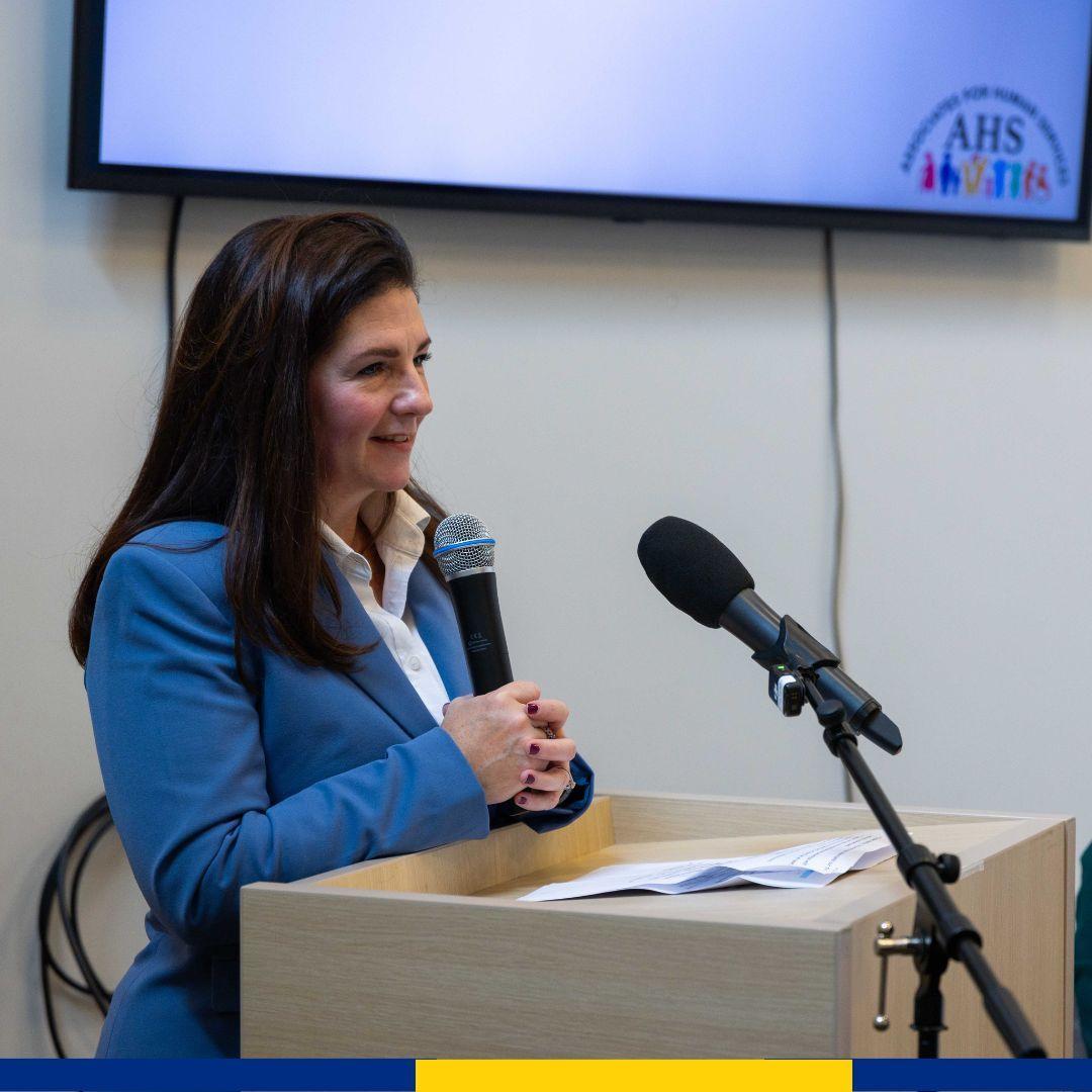 Marissa Weidner, Chief Corporate Responsibility Officer at Webster Bank at podium