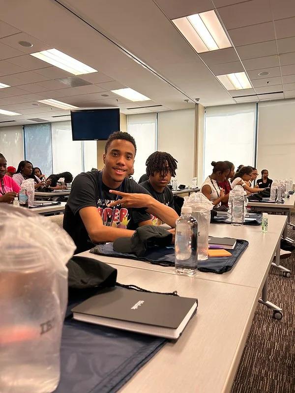 Students at desks in a room