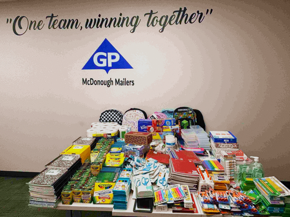 A table covered in school supplies