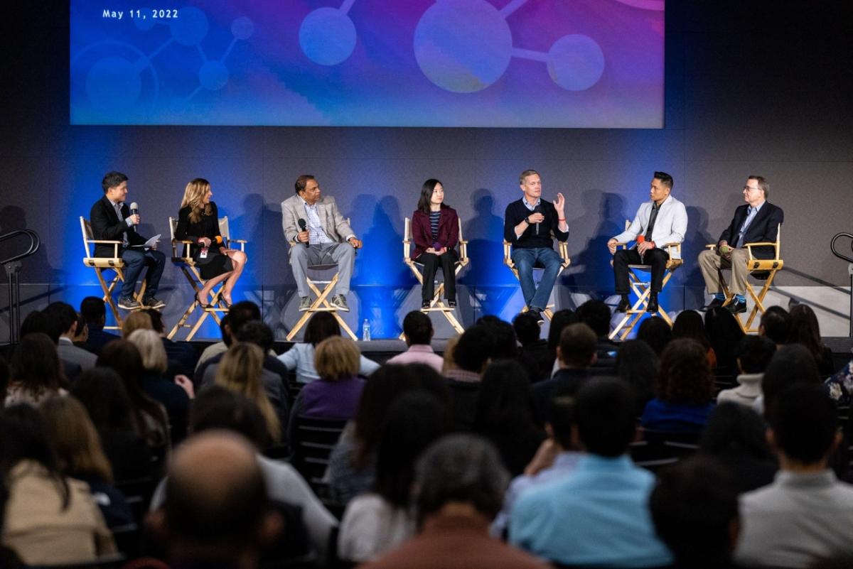 Panel on stage at Data Science Symposium