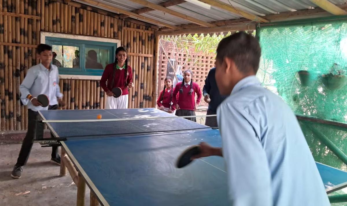 people playing table tennis